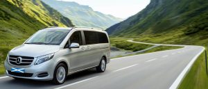 a car driving on a mountain road