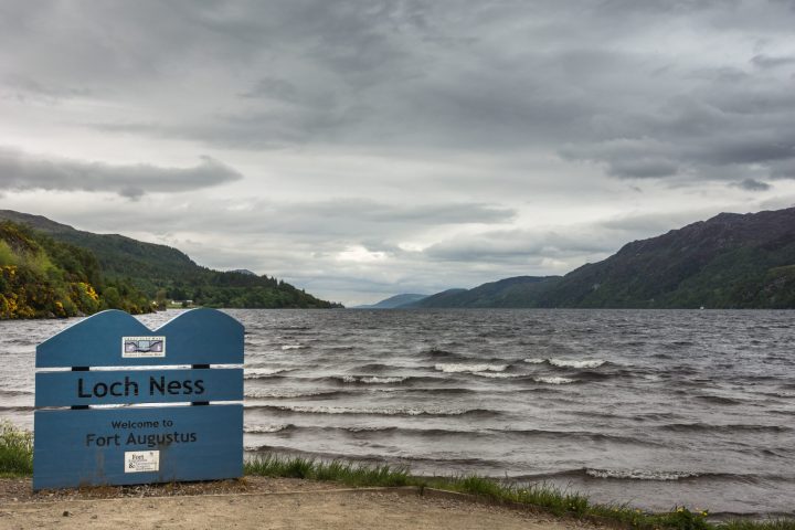 a beach with a mountain in the background
