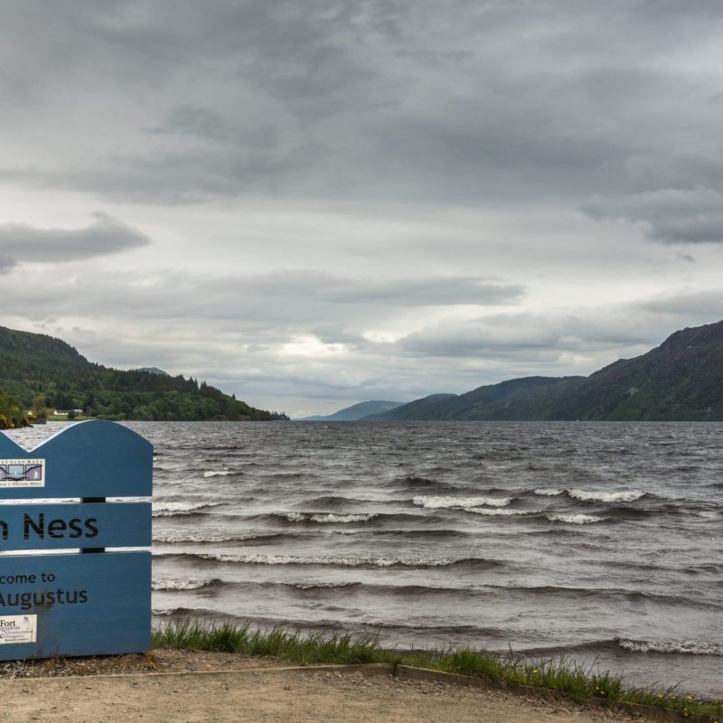 a beach with a mountain in the background