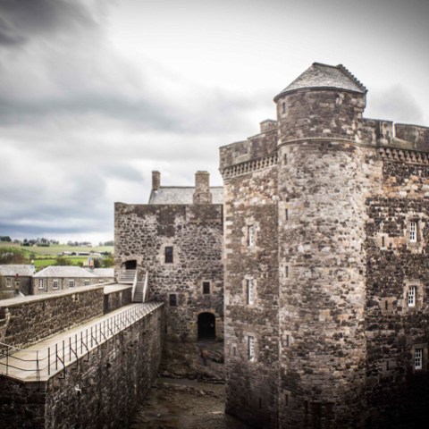 a castle on a cloudy day